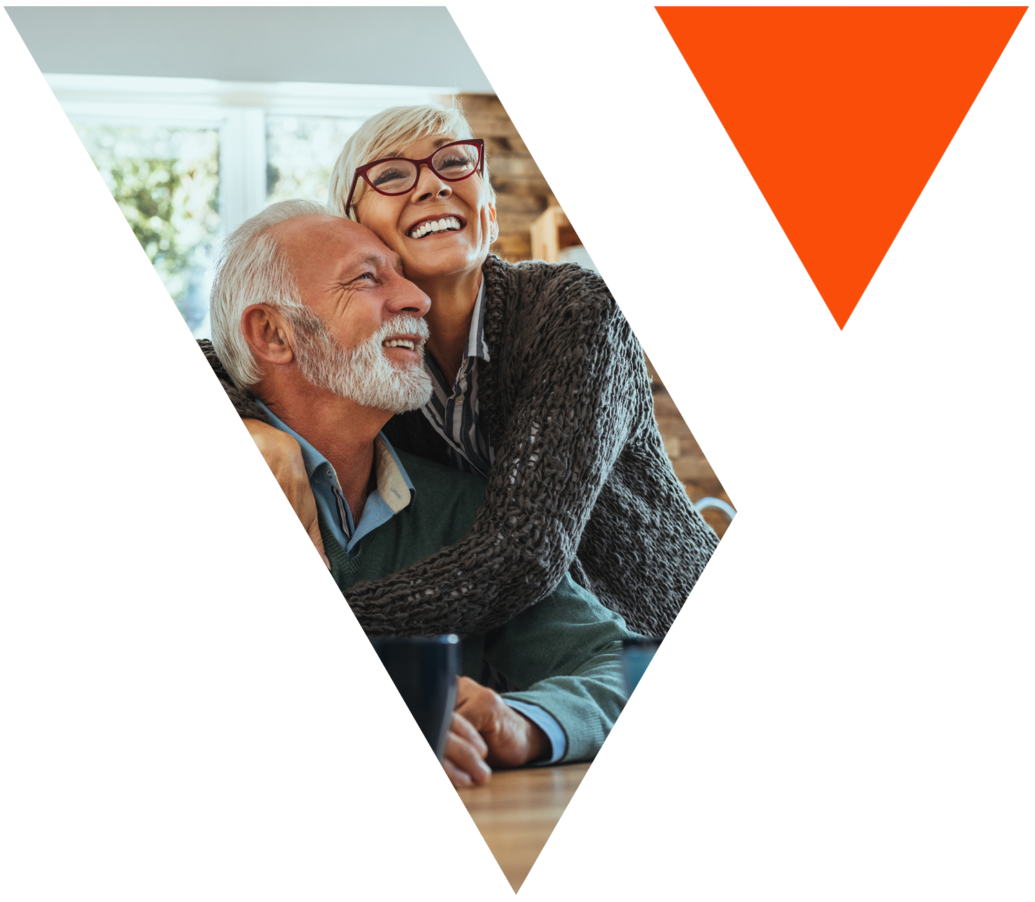 Older couple embraces in image shaped like the Vision Financial Group logo